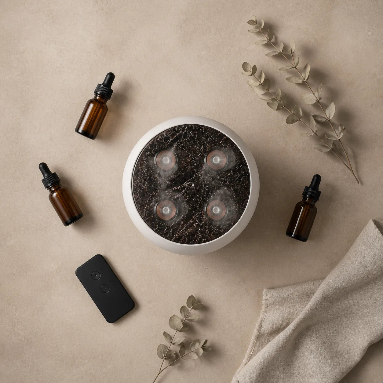 Top view of JellyFuser with essential oils and remote