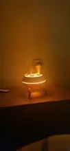 Small amber JellyFuser glow seen across a dark room