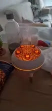 JellyFuser glowing red on a bedside surface